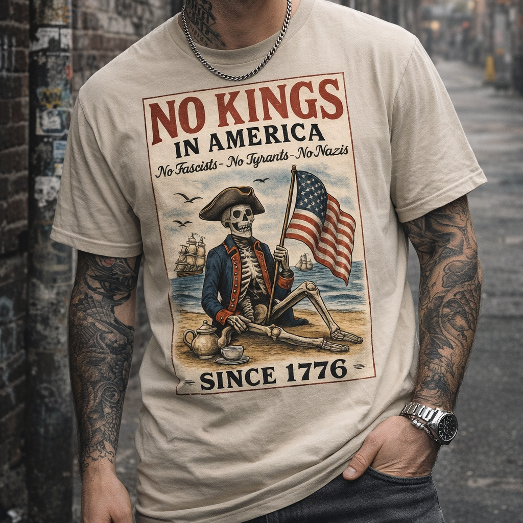 Sand No Kings In America political protest shirt featuring skeleton artwork, patriotic flag detail, and vintage political graphic